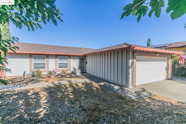 ranch-style home with a garage