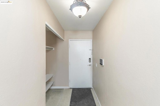 interior space with light tile patterned floors