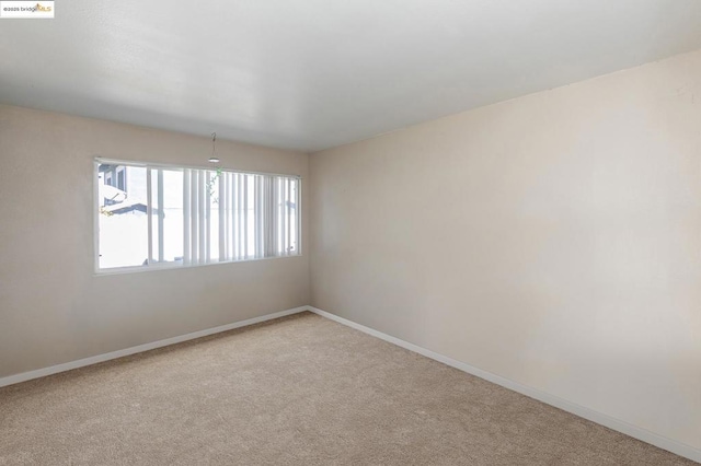 view of carpeted spare room