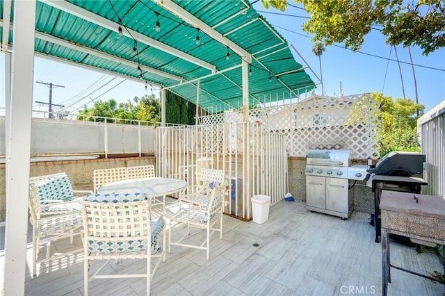 view of patio / terrace featuring a wooden deck