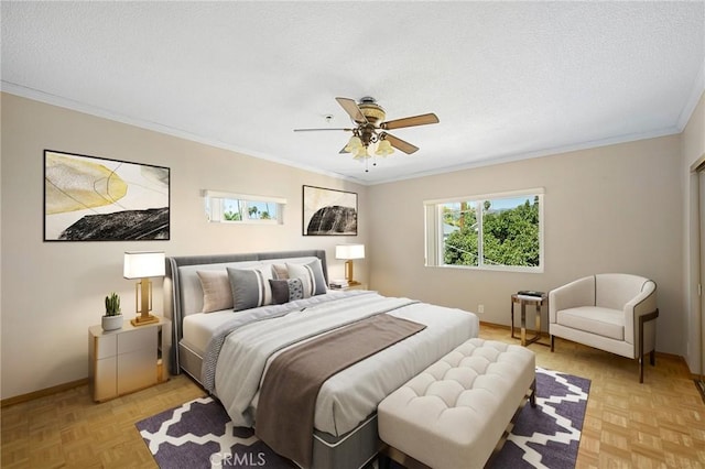 bedroom featuring ceiling fan, light parquet flooring, crown molding, and a textured ceiling