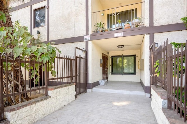 doorway to property featuring a balcony