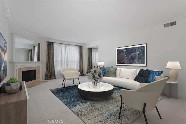 living room with carpet, a tiled fireplace, and crown molding