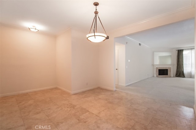 spare room featuring ornamental molding