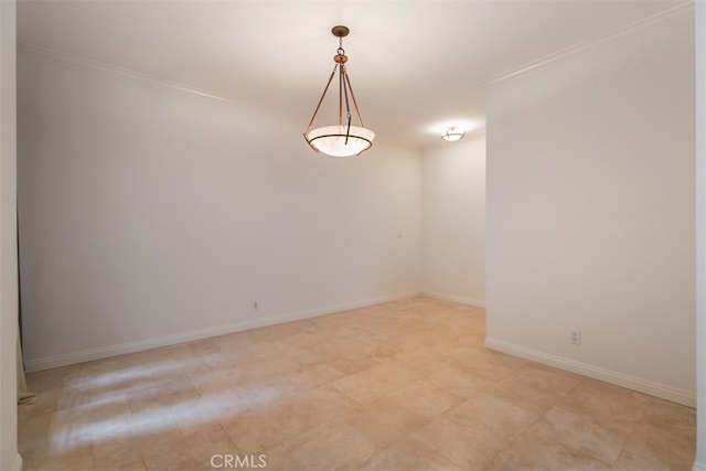 empty room featuring ornamental molding