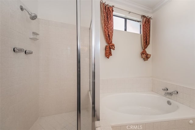 bathroom with shower with separate bathtub and crown molding