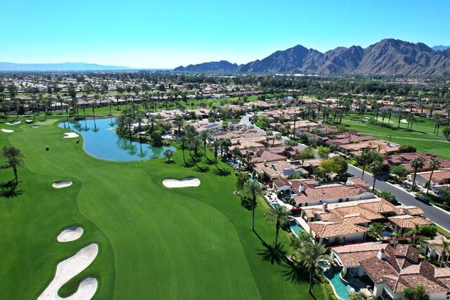 bird's eye view featuring a water and mountain view