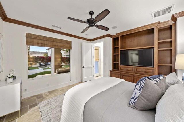 bedroom featuring ceiling fan and crown molding