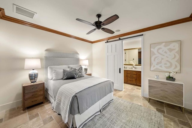 bedroom featuring connected bathroom, ceiling fan, crown molding, and a barn door