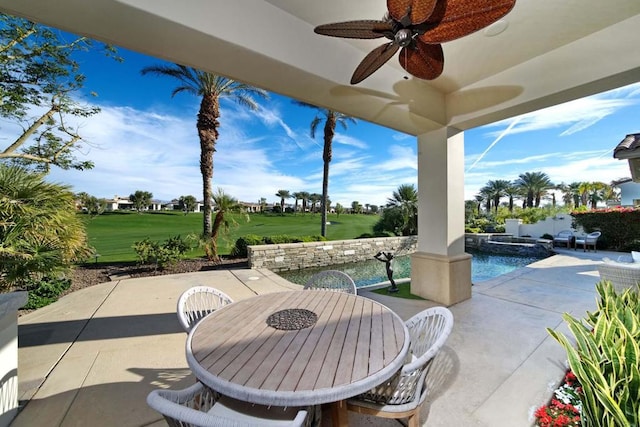 view of patio featuring ceiling fan