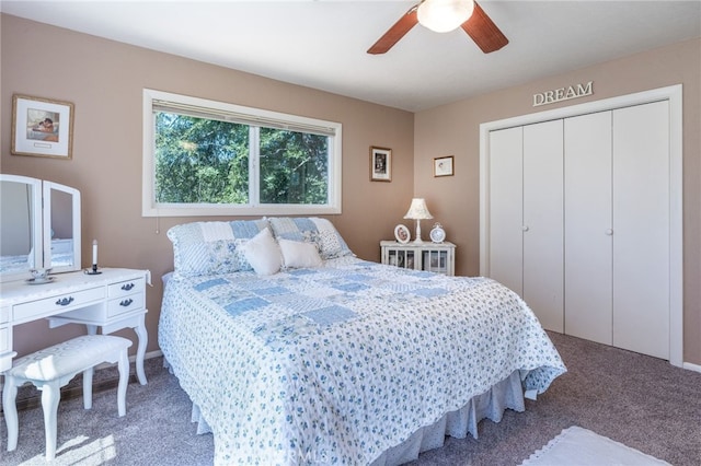 carpeted bedroom featuring ceiling fan and a closet