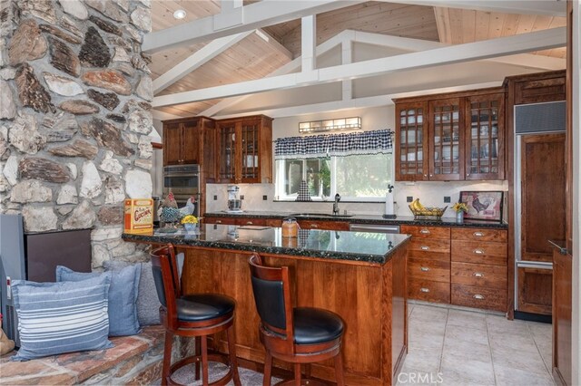 kitchen featuring decorative backsplash, wooden ceiling, a kitchen breakfast bar, and lofted ceiling with beams