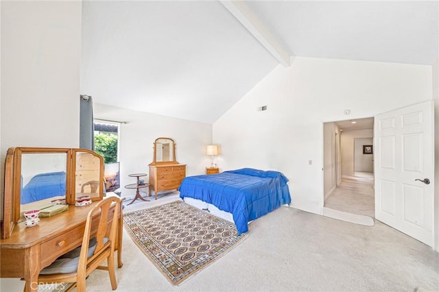 carpeted bedroom with high vaulted ceiling and beamed ceiling