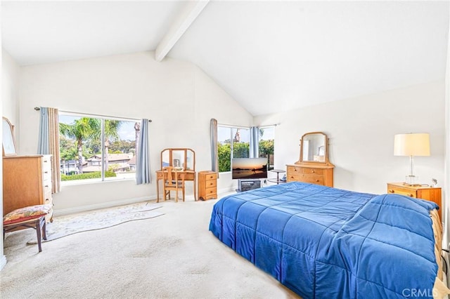 carpeted bedroom with vaulted ceiling with beams