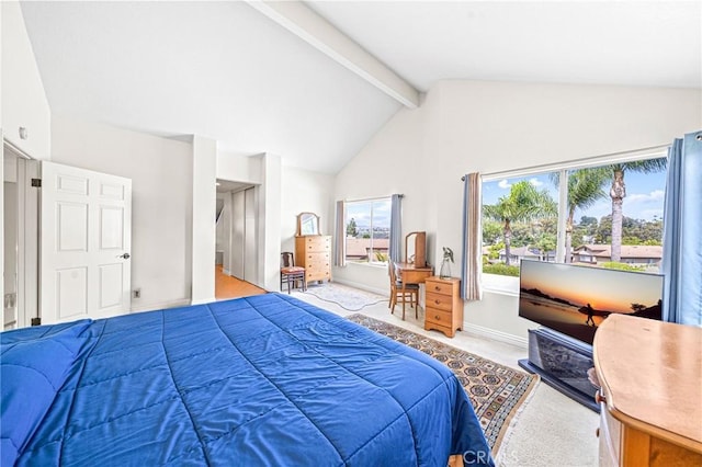 bedroom with light carpet, beam ceiling, and high vaulted ceiling