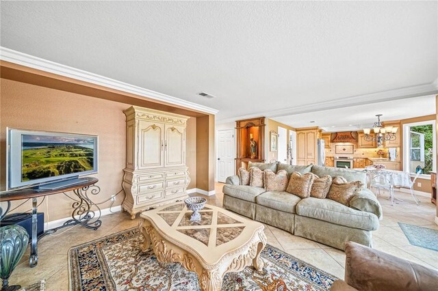 tiled living room with a notable chandelier and crown molding