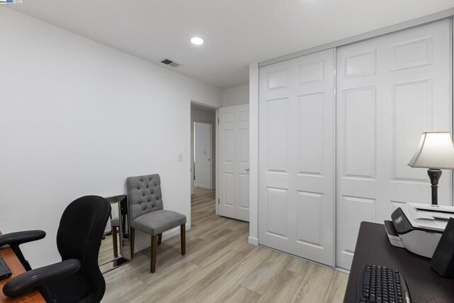 office area with light wood-type flooring