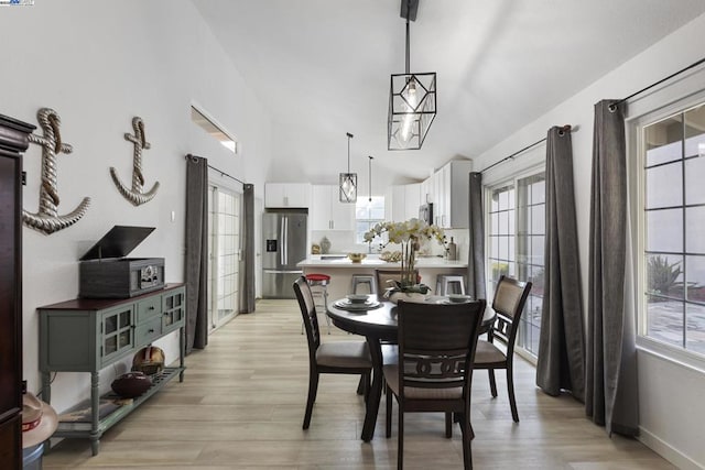 dining area with light hardwood / wood-style floors