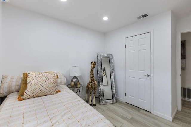 bedroom featuring light hardwood / wood-style flooring