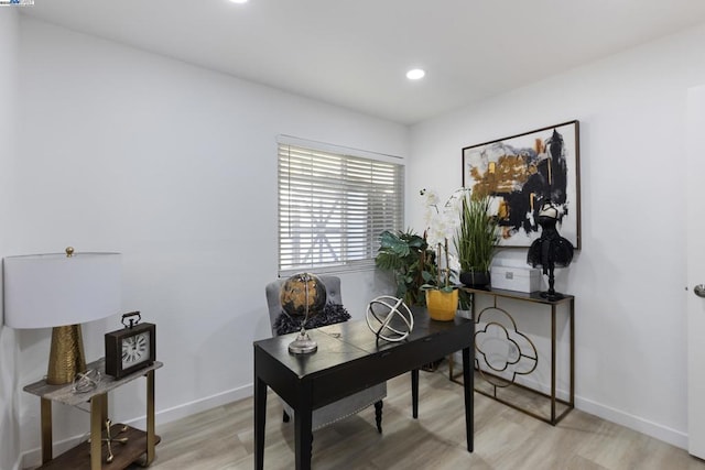 office space featuring light wood-type flooring