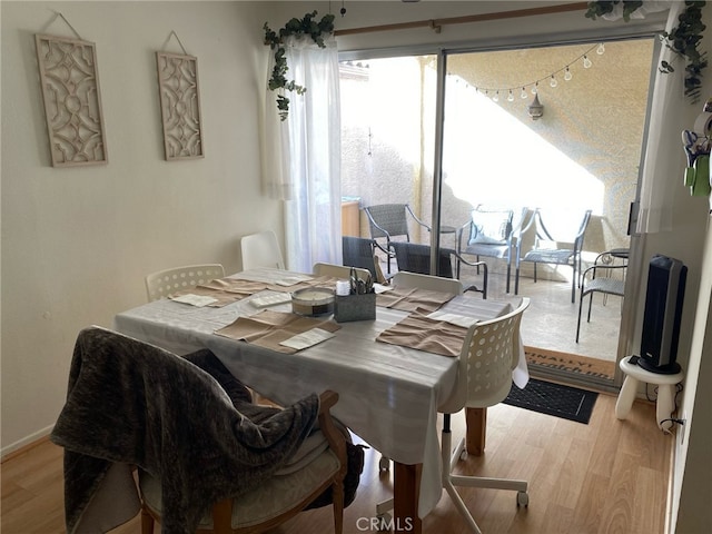 dining room featuring light hardwood / wood-style flooring