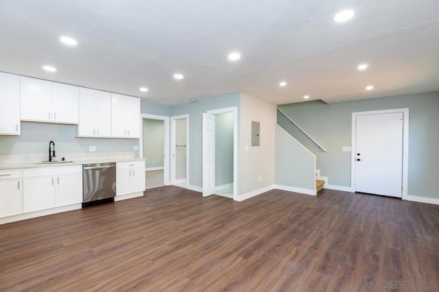 kitchen with dark wood-type flooring, sink, white cabinetry, and dishwasher