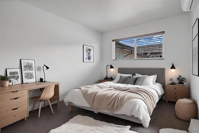 bedroom with a wall mounted air conditioner