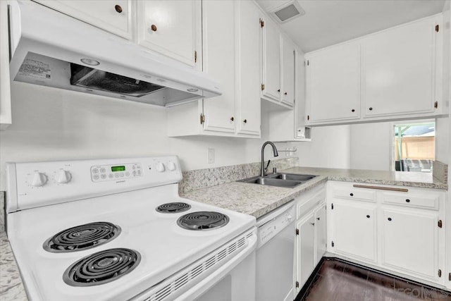 kitchen with white cabinetry, sink, and white appliances