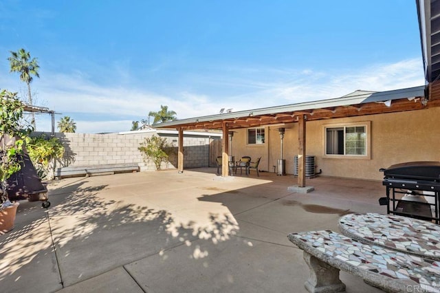 view of patio with central AC unit and grilling area