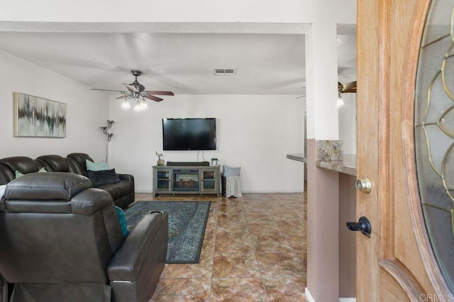 living room featuring ceiling fan