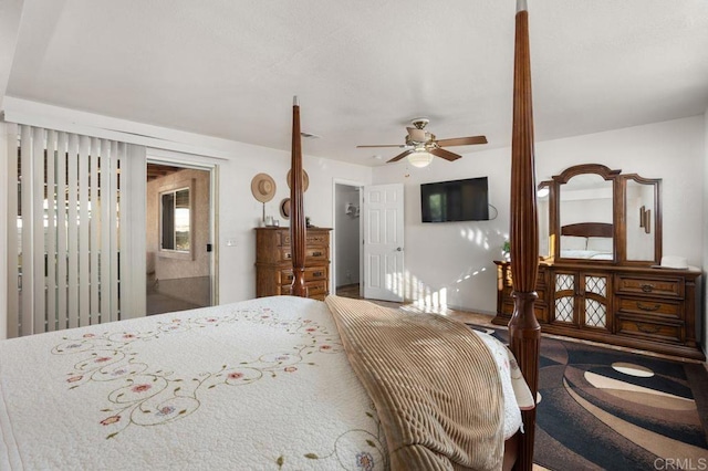 bedroom with ceiling fan and ensuite bath