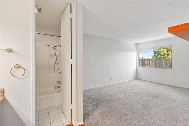 bathroom with shower / bathtub combination