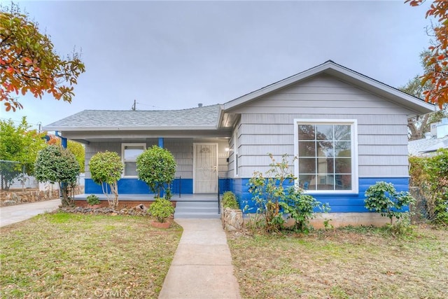 view of front of home with a front lawn