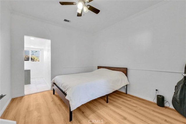 bedroom featuring ceiling fan and light wood-type flooring