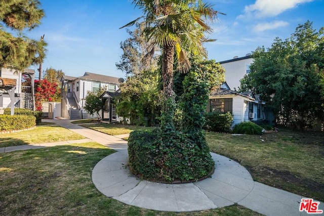 exterior space with a front lawn