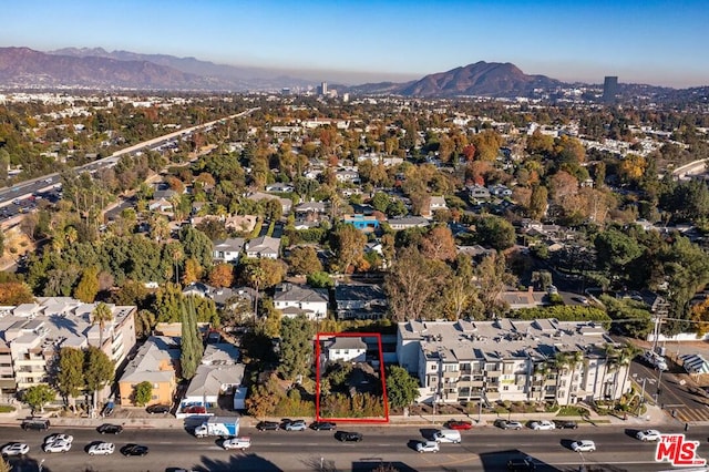 bird's eye view with a mountain view