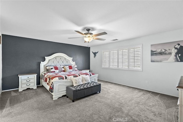 bedroom featuring ceiling fan and carpet flooring