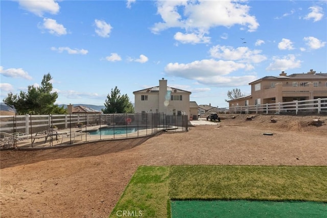 view of home's community with a swimming pool