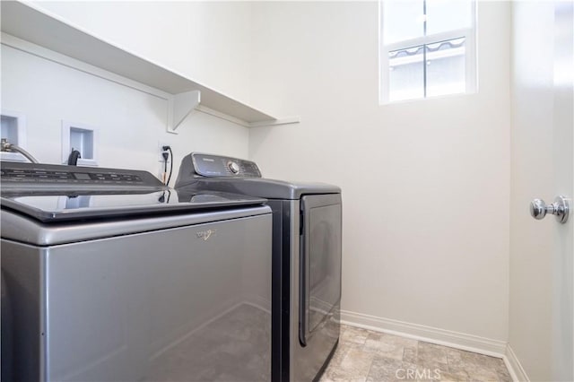 washroom with washer and clothes dryer