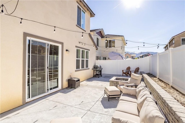 view of patio / terrace with grilling area and an outdoor hangout area