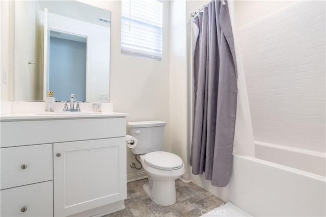 full bathroom with toilet, vanity, and shower / bath combination with curtain