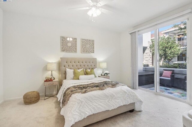 carpeted bedroom with access to outside and ceiling fan