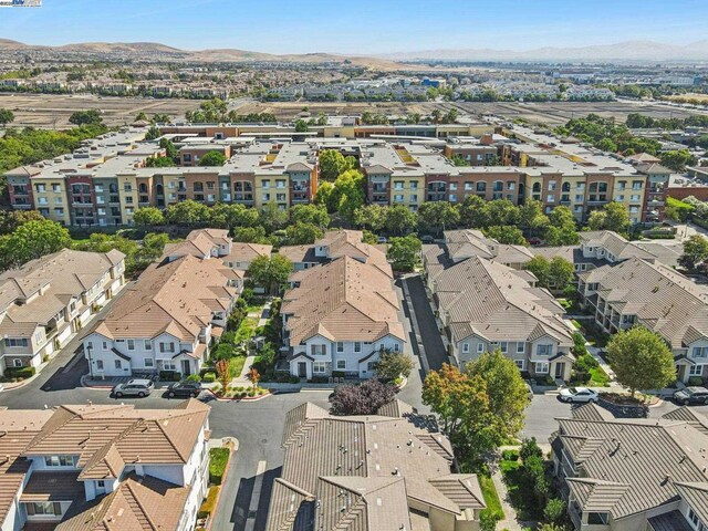 drone / aerial view featuring a mountain view