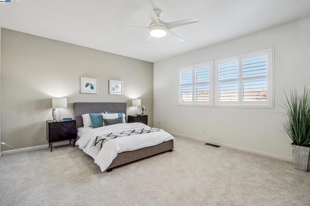 bedroom featuring ceiling fan and carpet flooring