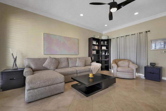 living room featuring ceiling fan, light tile patterned floors, and crown molding