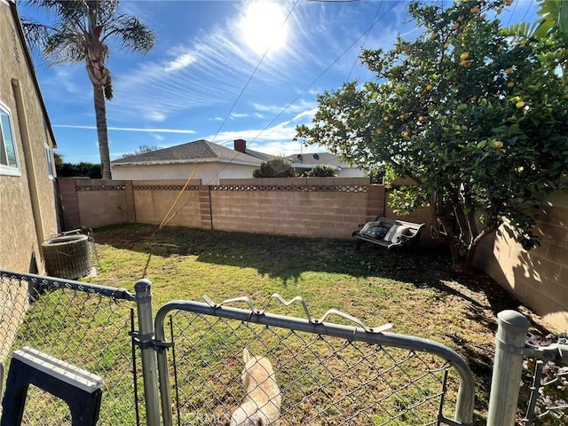 view of yard with central AC unit