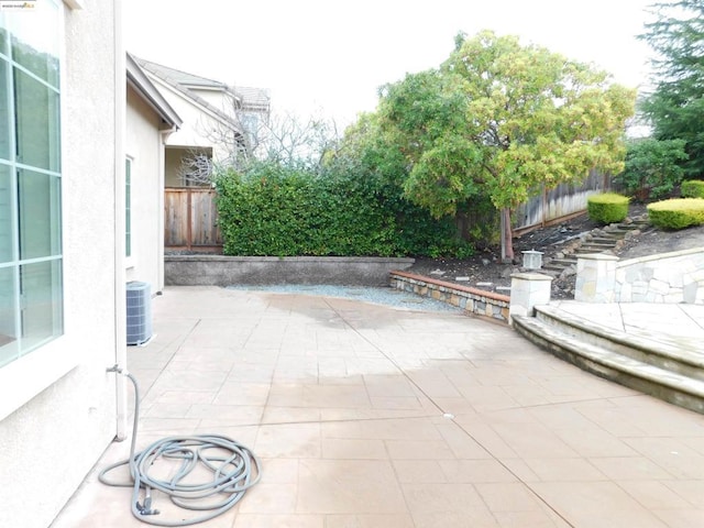 view of patio featuring central air condition unit