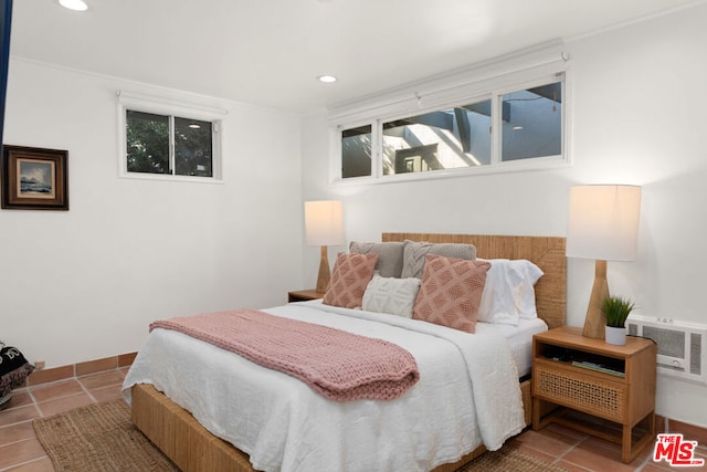 bedroom with light tile patterned flooring