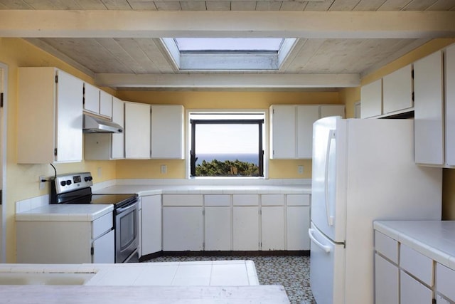 kitchen with white fridge, electric range, a skylight, white cabinets, and wooden ceiling