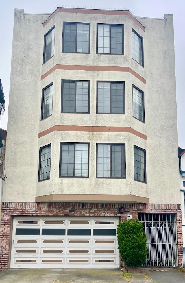 view of building exterior with a garage